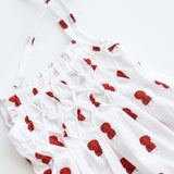 raphael hand smocked romper - lady bug