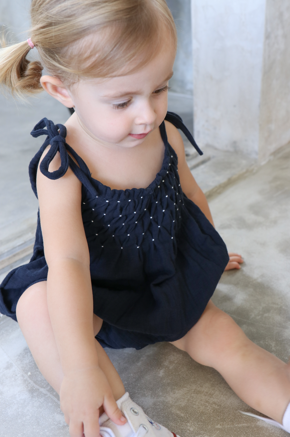 raphael smocked romper - navy